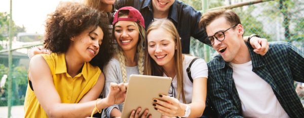 Friends,In,The,Park,Using,A,Digital,Tablet,Millennial,And