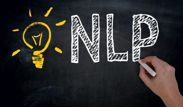 NLP is written by hand on blackboard