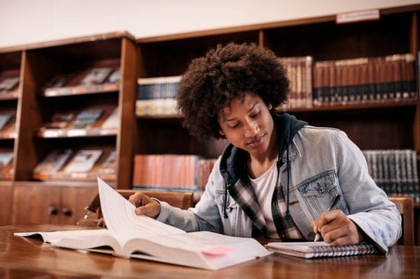 University student taking notes