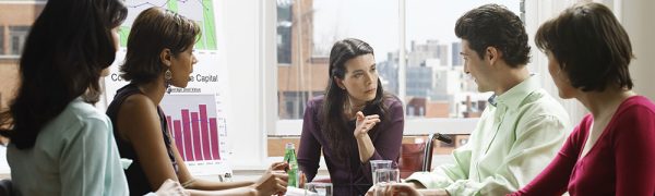 Five Business People in a Meeting